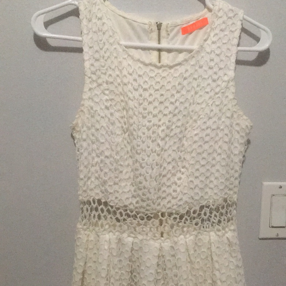 White lace dress with crochet cutout